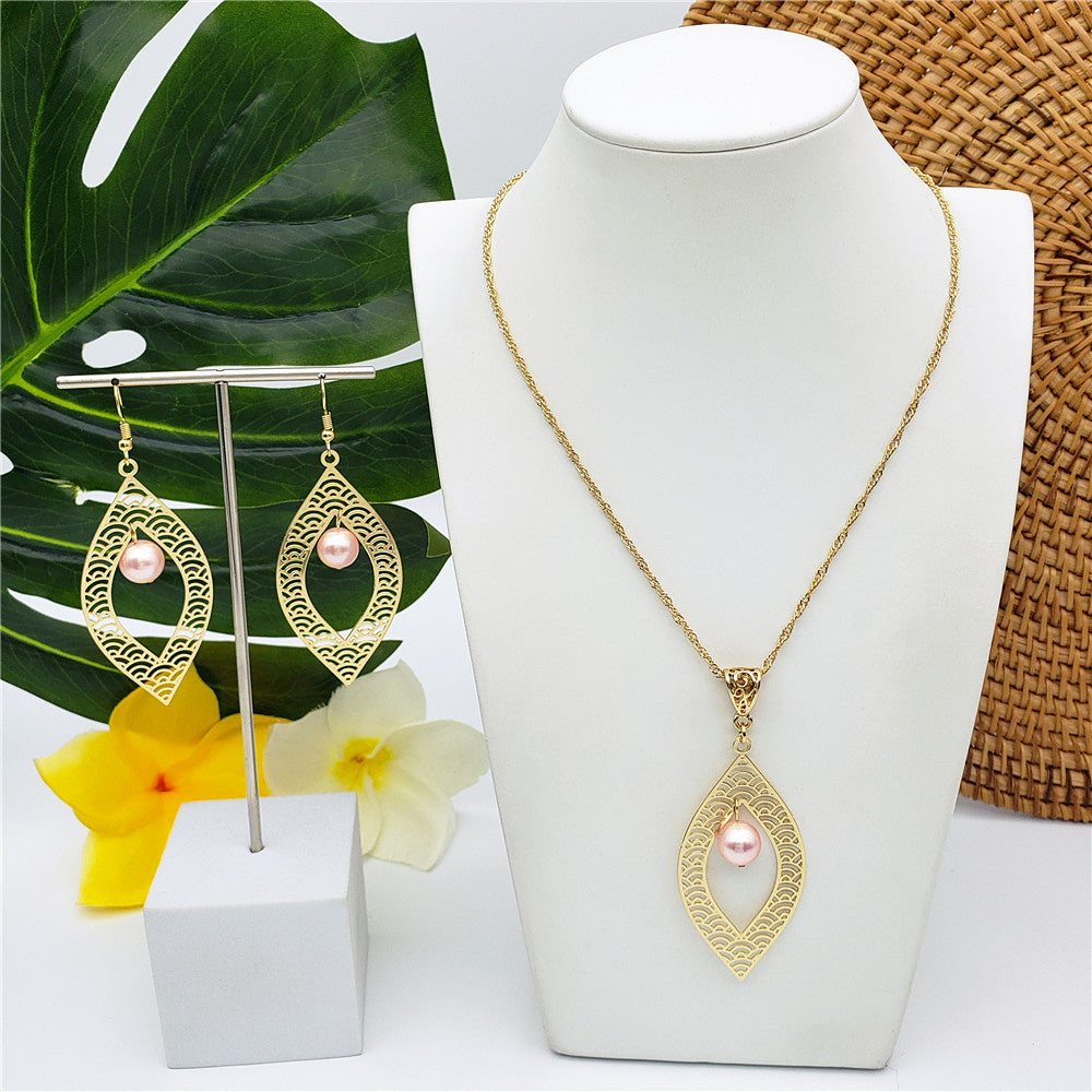 Set Of Carved Waves Double Leaves Earrings And Necklace Sustained With A Pearl In Different Colors