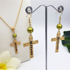 Set Of Engraved "Kuuipo" Carved Cross Earrings And Necklace Sustained With A Pearl In Different Colors