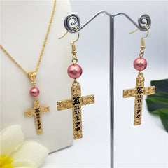 Set Of Engraved "Kuuipo" Carved Cross Earrings And Necklace Sustained With A Pearl In Different Colors