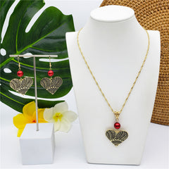 Set Of Carved Heart Earrings And Necklace Sustained With A Pearl In 2 Different Colors