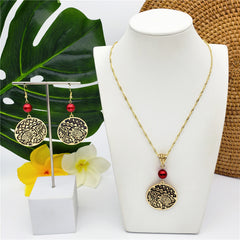 Set Of Carved Round Hawaiian Turtle Earrings And Necklace Sustained With A Pearl In 2 Different Colors