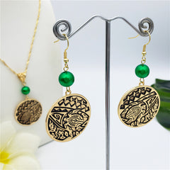 Set Of Carved Round Hawaiian Turtle Earrings And Necklace Sustained With A Pearl In 2 Different Colors